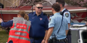 Four injured, including police officer, in knife attack leading to car crash in Sydney